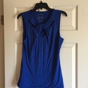 Blue sleeveless tank top with cutout design